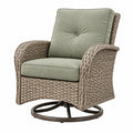 Sillón giratorio 79 x 85 x 101 cm de fibra trenzada beige y tapizado verde para exterior